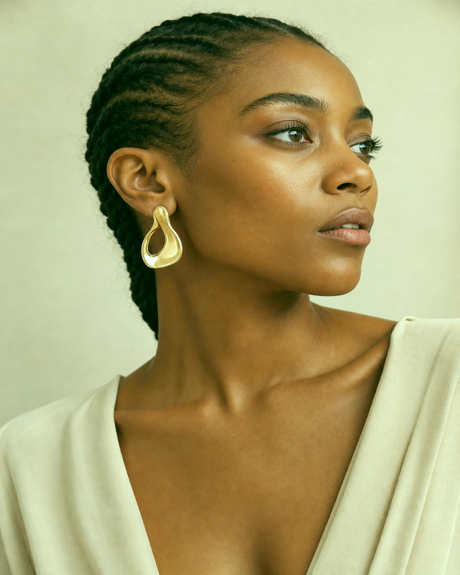 Detail editorial view of the Ayana Sculptural Gold Earrings