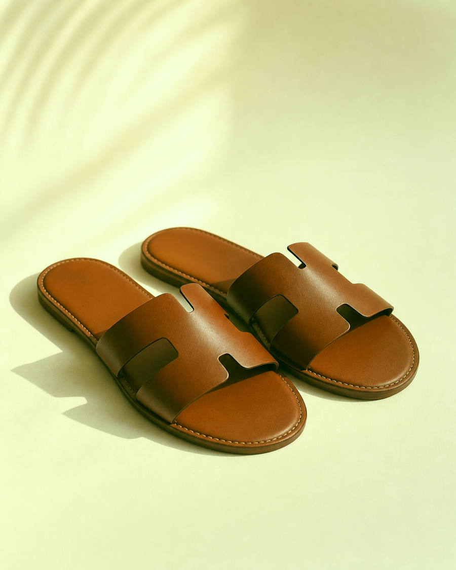 Detail editorial view of the Lamu Leather Slide Sandals