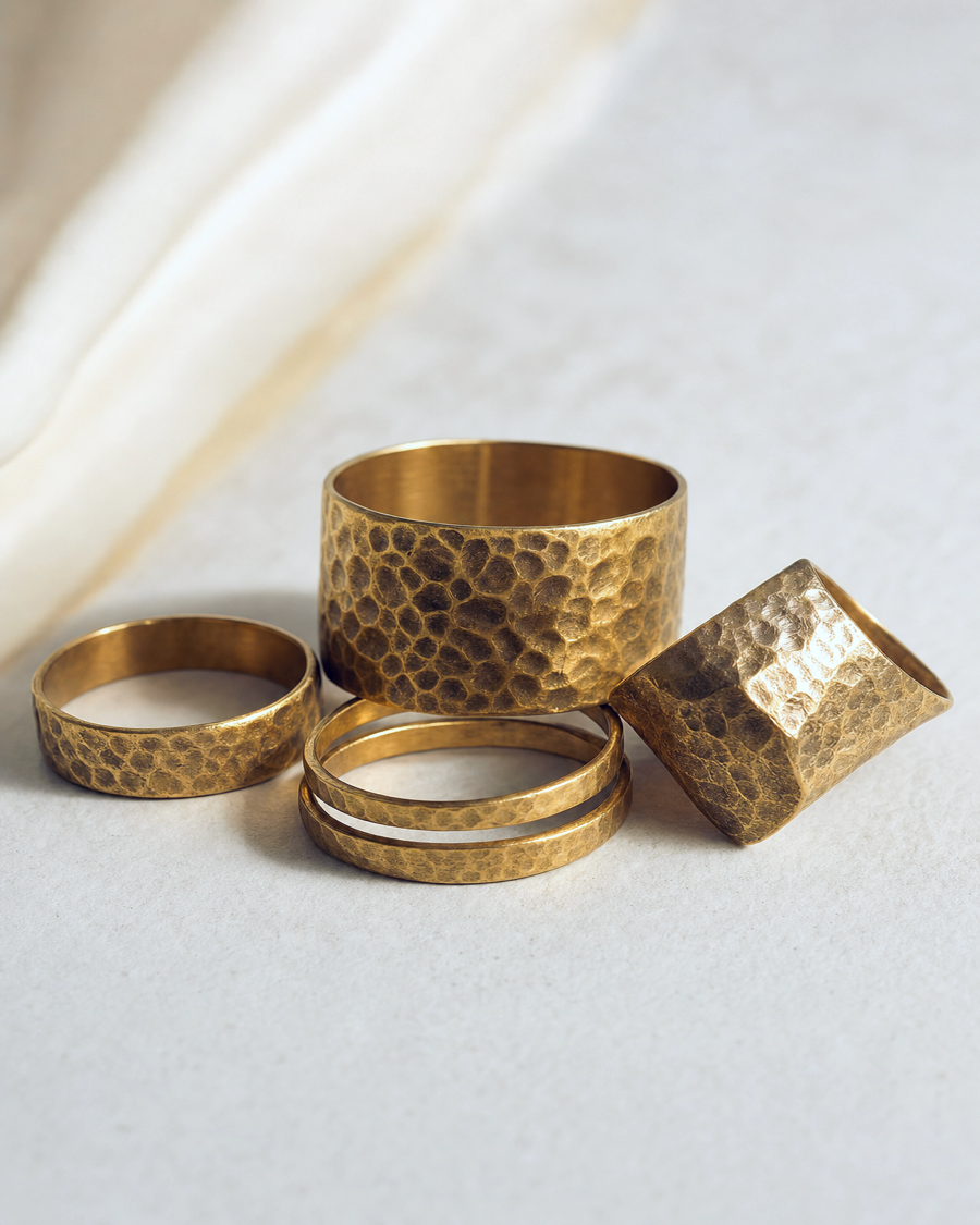 Editorial movement view of the Oru Hammered Brass Ring Set