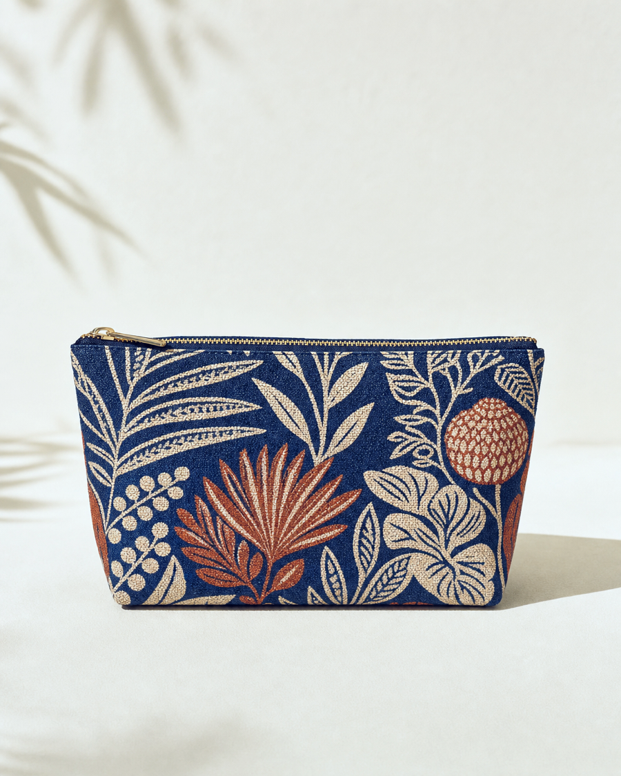 Editorial movement view of the Tula Printed Travel Pouch