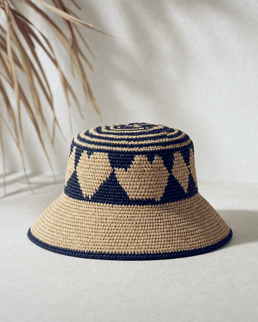 Editorial movement view of the Zola Raffia Bucket Hat